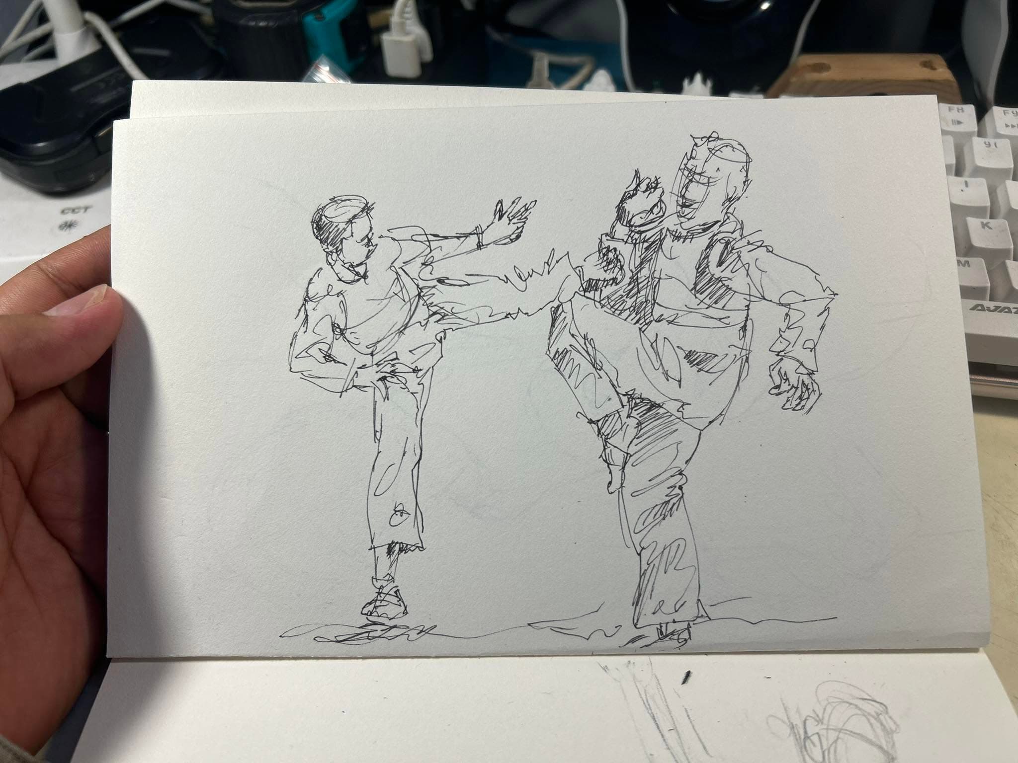 Two Figures, One Gesture